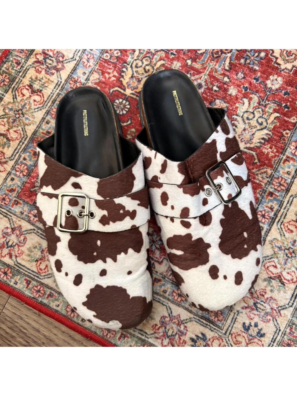 PRETTY LITTLE THING COW PRINT MULES